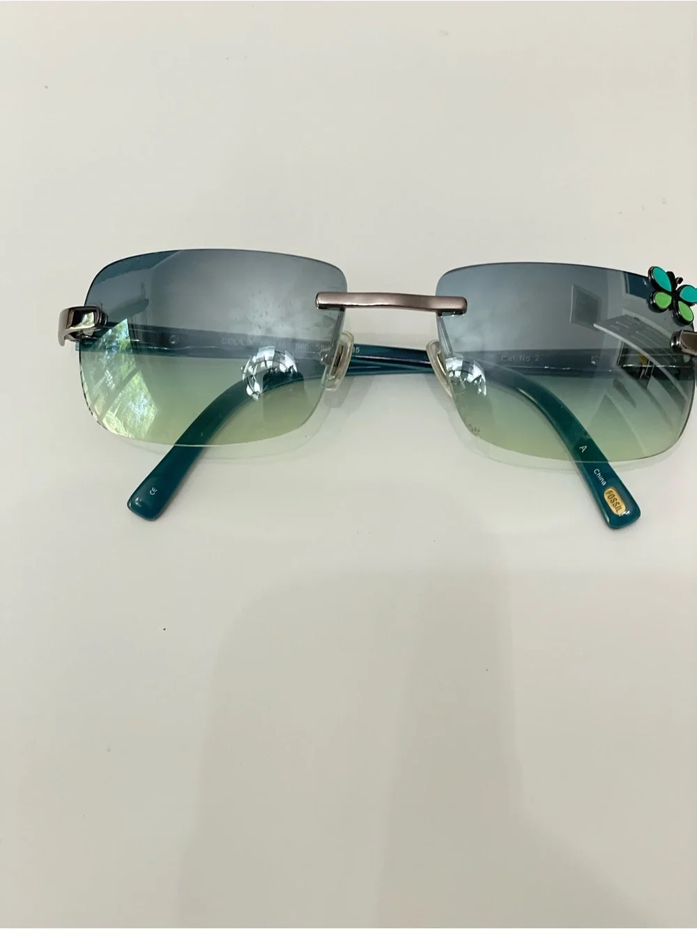 Fossil Vintage Y2K Cecelia Square Rimless Teal Butterfly Sunglasses